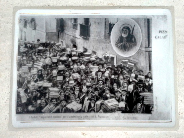 faithful carrying bricks to rebuild the church